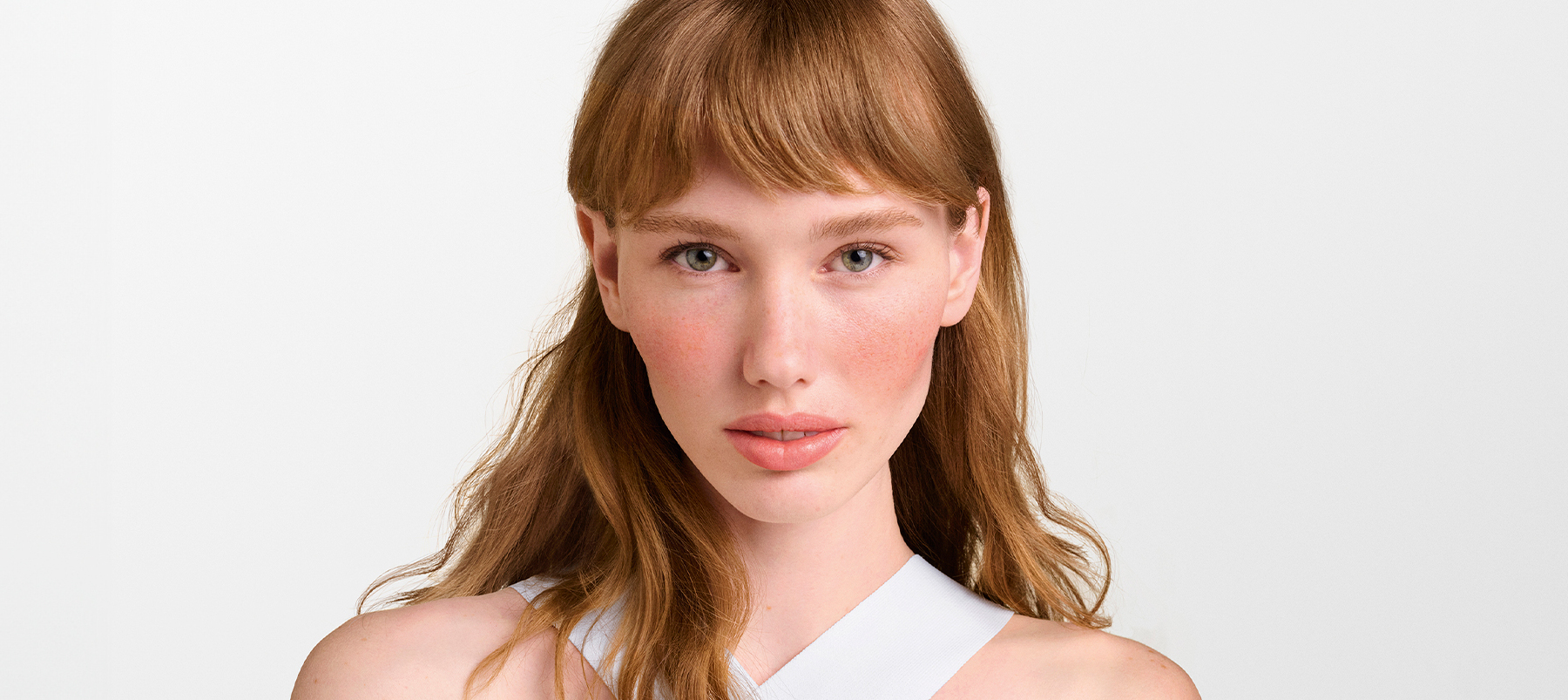 Woman with mild facial redness